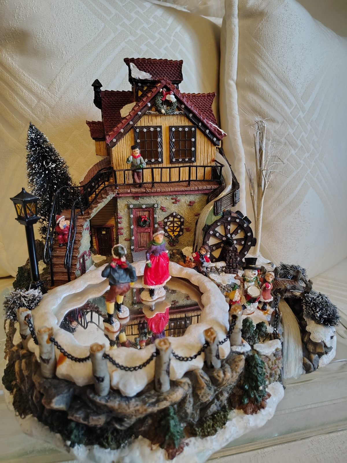 Lighted Christmas village with skating pond from Lorene's collection